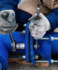 Plumber working on pipeline using 5 Pack M4 X 100mm Fully Threaded Rods In 304 Stainless Steel With Nuts And Washers