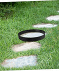 Round Concrete Paver Mold For Stepping Stones Garden Pathway Mold For DIY Walkways Reusable Plastic Pavement Tile Maker For Outdoor Path Decor And Floor Tile Projects on a grassy path