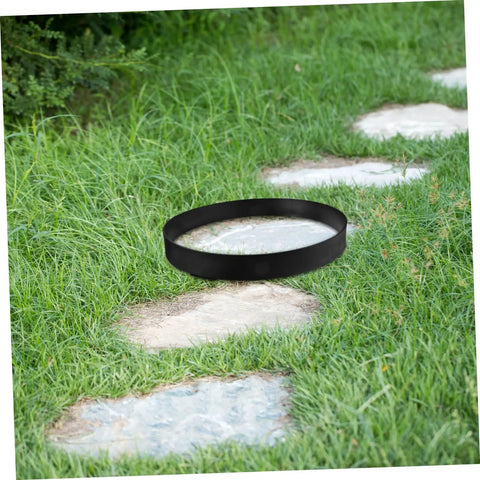 Round Concrete Paver Mold For Stepping Stones Garden Pathway Mold For DIY Walkways Reusable Plastic Pavement Tile Maker For Outdoor Path Decor And Floor Tile Projects on a grassy path