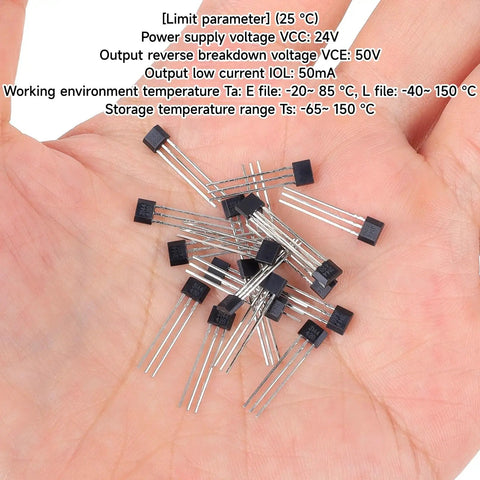 Top Shelf A3144 Hall Effect Sensors 20 Pack in hand with 3 pins for Arduino projects, black housing, compact design.