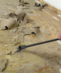 Long Reach Extension Scraper with 11 Inch Handle and Double Edged Blades for removing floor material, close-up view