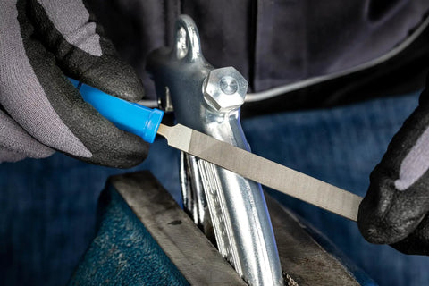 Using 4 Inch Key File Set 265A 6 Piece Second Cut With Quick Mounting Handle for precision filing on metal part, protective pouch Part 17009