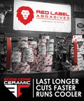 Red Label Abrasives workshop with stacks of Ceramic Sanding Belts 2x72 Inch 36 Grit for metal grinding and deburring.