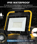 Ultra Bright 12000 Lumen LED Work Light With 128 LEDs Portable Flood Light showing IP66 waterproof feature in rain.
