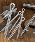 Stainless Steel Cotter Pin Kit For Mechanics With Corrosion Resistant Spring Clips In Multiple Sizes next to bolts and washers