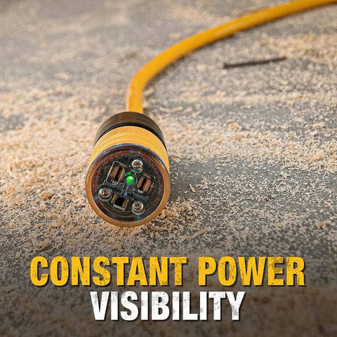 Close-up of 25 Foot Lighted Extension Cord with Click To Lock End 10 3 SJTW Heavy Duty Outdoor Power Cable showing plug and LED light on ground.