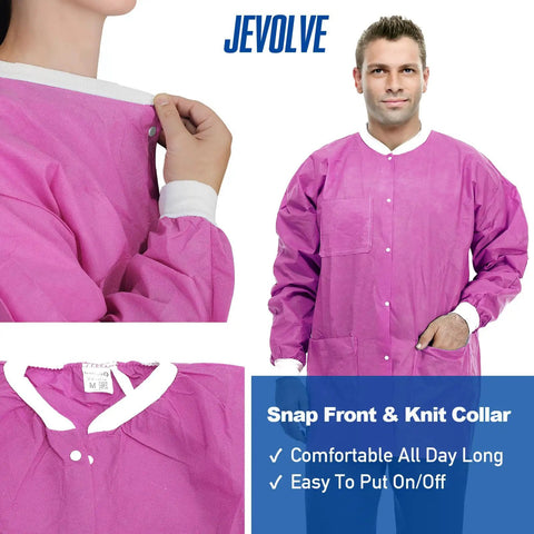 Man wearing pink 50 pack disposable lab coats for adults hip length with pockets and knit cuffs 45gsm SMS multi layer fabric