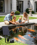 Family by koi pond with No Fuss Pond Solar Aerator 2W Low Noise Oxygen Pump IP64 Waterproof Bubbling System for wildlife-friendly air exchange.