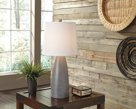 Shavontae Modern Table Lamps Set Of 2 27.5 Inch Gray Resin Bases With White Fabric Drum Shades on wooden table by window