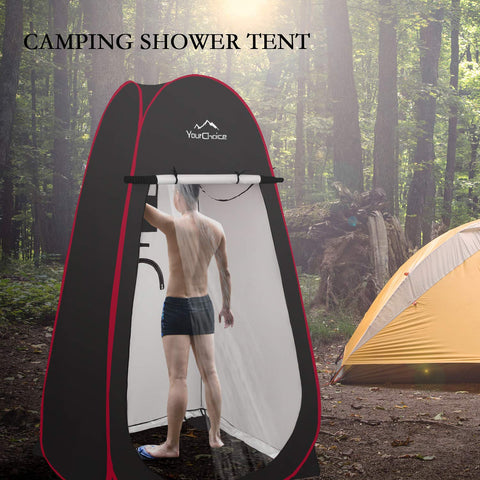 Instant Pop Up Privacy Tent 3.9x3.9x6.9 Ft large portable changing room with a person inside, set up in a forest