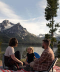 Family enjoying Go Anywhere Camping Chair With Padded Seat And Backrest Adjustable And Ultra Portable Lightweight Blue Alloy Steel Frame