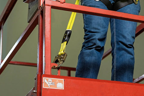 Person using Non Shock Absorbing Lanyard 4 Ft With Self Locking Steel Hooks Durable 1 Inch Nylon Webbing Label Cover OSHA And ANSI Compliant