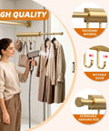 Knockout Twelve Inch Retractable Closet Pull Out Rod Featuring Five Heavy Gauge Steel Rings For Zero Fuss Hangin Of Belts And Accessories handles coats, shown in use with clothing.