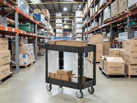 Heavy Duty Two Tier Rolling Utility Cart Built Like A Tank With Super Smooth Locking Casters Ergonomic Handle Supports Six Hundred Pounds in warehouse.