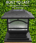 Premium Solar Outdoor Post Cap Light in slate black with rain droplets, shown against green background, IP44 waterproof design.