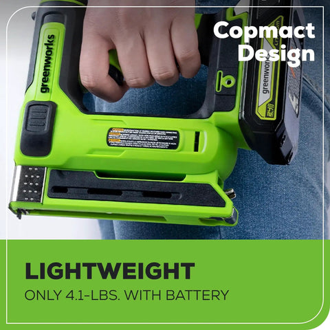 Person holding a 24V Crown Stapler With Three Eighths Inch Crown Staples, 2Ah Battery And 2A Charger, Cordless, Lightweight design, green color.