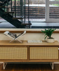 Wooden cabinet with Six Pack White Alloy Cabinet Handles Single Hole Round Drawer Pulls in a modern living room setting.