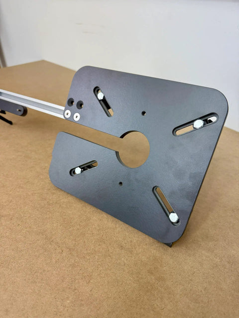Close-up of Adjustable Circle Cutting Jig For Routers, solid metal base with slots for easy adjustments and precise cuts.