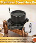 Old School Stone Grain Mill Hand Grinder For Flour And Seeds with Stainless Steel Handle on wooden countertop