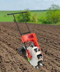 Manual Hand Push Garden Seeder Walk Behind Row Crop Planter With 10 Nozzles in a tilled field
