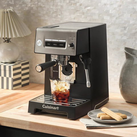 Professional Grade Home Espresso Maker Featuring Solid Twenty Bar Pressure And A Stainless Steel Bottomless Portafilter brewing iced coffee.