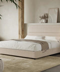 Queen Size Cloud Bed Frame In Beige Plush Boucle Upholstery with soft cushions and throw blanket in a modern bedroom.