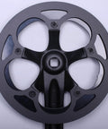 Rugged Aluminum Chainring Guard for 130mm BCD Sprockets, black anodized, top view showcasing its beefy structure for MTB and e-bikes.