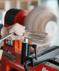 Heavy Duty 1 Inch Diameter Woodturning Lathe Tool Rest Set with hardened steel bars in use, shaping a wooden piece while cutting.
