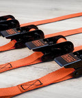 Top Shelf Ratchet Tie Down Straps 1 Inch By 10 Feet 4 Pack No Sweat Truck Cargo Lashing Kit All Weather Polyester for secure rolling hauls with quick grip mechanism.