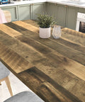 Kitchen table with brown wood contact paper peel and stick countertop vinyl wrap waterproof wood grain wallpaper installed.