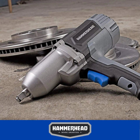 Beefy 7.5 Amp 1/2 Inch Impact Wrench Delivers 240 Ft-Lbs Torque, 2200 RPM, 2700 IPM With Friction Ring Anvil next to brake discs