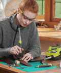 Badass 18 Volt Cordless Mini Rotary Tool With 35 Premium Accessories For Ultra Fast Diy Engraving Polishing And Precision Sanding Projects in use on leather