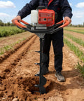 Person using Gas Powered Post Hole Digger With 2.3HP Engine Earth Auger Kit with 3 Drill Bits and 11.81 Inch Extension on soil
