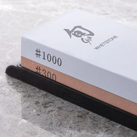 Dual Sided Knife Sharpening Whetstone With Ceramic Grit 300 And 1000 For Honing Edges, 6 Inch DM0708 on marble surface