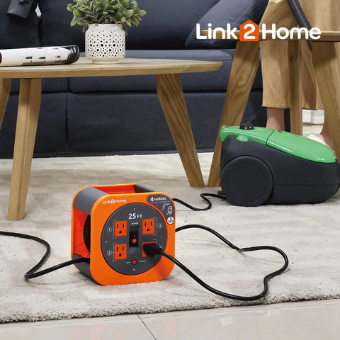 Heavy Duty 25 Foot Cord Reel With Four Outlets Extension Cord 16 AWG SJT Cable Built In Circuit Breaker Overload Protection in living room
