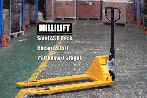 Workhorse Manual Pallet Jack With 6600 Lb Capacity And 48 Inch By 27 Inch Forks Yellow Hand Pallet Truck in warehouse aisle