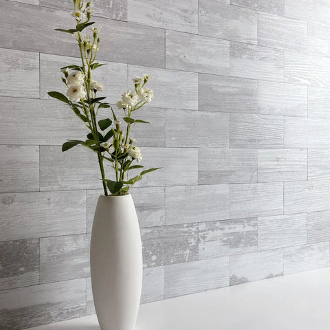 Easy Peel And Stick Three Inch By Six Inch White Birch Subway Backsplash Tiles Set Of One Hundred Pieces Covers Over Twelve Square Feet Ideal For Kitchen Bathroom Laundry Camper And Fireplace Realistic Textured Pvc That Is Scratch Resistant And Colorfast shown with white vase on countertop
