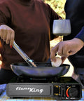 Dual Fuel Gas Camping Stove For Butane Or Propane, Portable Single Burner With people cooking outdoors