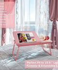 Multiuse Bed Lap Desk With Tilted Angles For Laptops Foldable Portable Bed Table displayed on bed with magazines and snacks, candy pink