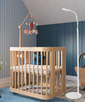Floor Stand For Nanit Pro Baby Monitor With Gooseneck Swivel Holder in a nursery, next to a crib, adjustable height, stable base.