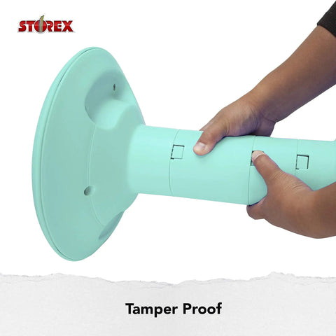Person adjusting Adjustable 12 to 18 Inch Height Wiggle Stool for Class and Home Study, showing Teal Cushioned Seat with Handle.