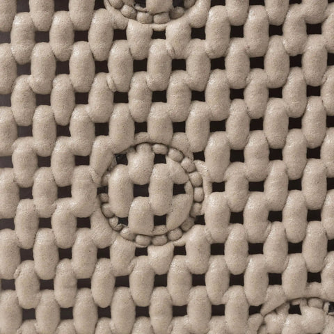 Close-up texture of Softex Bath Mat For Tubs 17 By 36 Inches Taupe Machine Washable Skid Resistant With Suction Cups and Drain Holes.