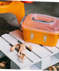 Orange container with Six Pack Stainless Steel Toggle Latch With Extended Hook And Spring Loaded Mechanism on a white pallet.