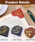Fourteen Genuine Leather Heart Bookmarks With Uplifting Bible Verses showing red and blue heart bookmarks with needlework.
