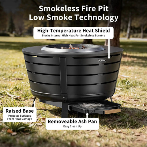 26 Point 5 Inch Smokeless Fire Pit With Stand For Outdoor Hangouts Portable Backyard Bonfire Pit For Patio Camping Includes Removable Ash Pan And Heat Shield Stainless Steel Wood Burning Design. Features raised base and removable ash pan in a lawn setting.