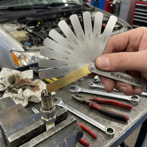 Stainless steel feeler gauge set with 32 blades (0.04–0.88 mm) for spark plug gap measurement