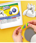 Hands shaping colorful clay next to Air Dry Modeling Clay Alternative White Modeling Material For Kids Four Pack Eight Oz Each In Resealable Bucket.