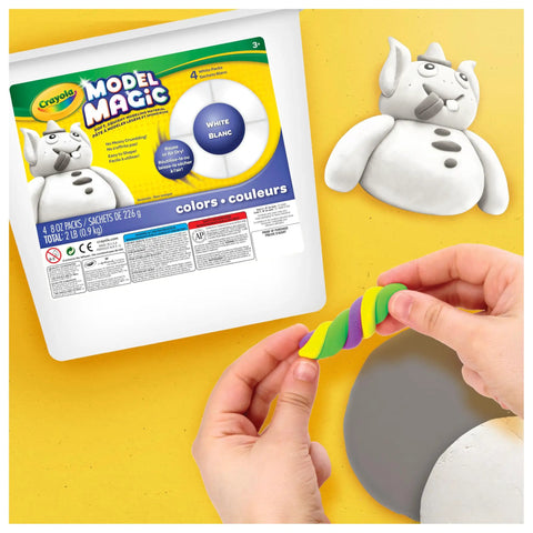 Hands shaping colorful clay next to Air Dry Modeling Clay Alternative White Modeling Material For Kids Four Pack Eight Oz Each In Resealable Bucket.