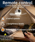 Rechargeable Portable Ceiling And Desk Fan With Light And Remote 11 Inch Camping RV Tent Fan in a tent, showing remote control in hand.