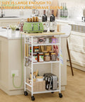 Super Smooth Rollin 4 Tier Microwave Cart With Gotta Have Storage For Coffee Bar Printer Stand Or Kitchen Counter Easy Glide Wheels in use with food items
